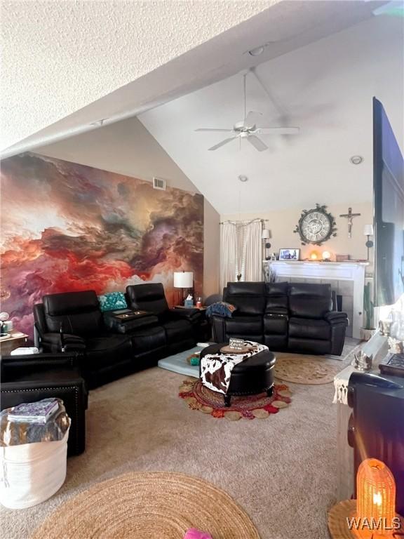 2712 Shady Bank Ln, Northport, AL 35473 - carpeted living room featuring lofted ceiling and a ceiling fan