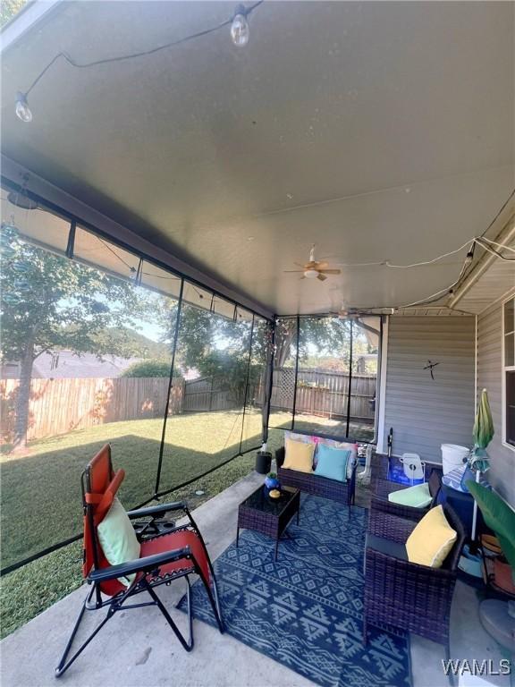 2712 Shady Bank Ln, Northport, AL 35473 - sunroom with outdoor lounge area and ceiling fan