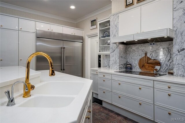 kitchen featuring custom exhaust hood, stainless steel double oven, black electric cooktop, sink, and white cabinetry