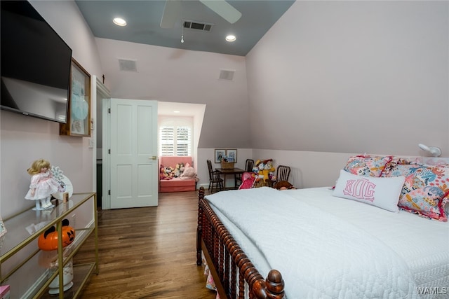 bedroom featuring dark hardwood / wood-style floors, ceiling fan, and lofted ceiling