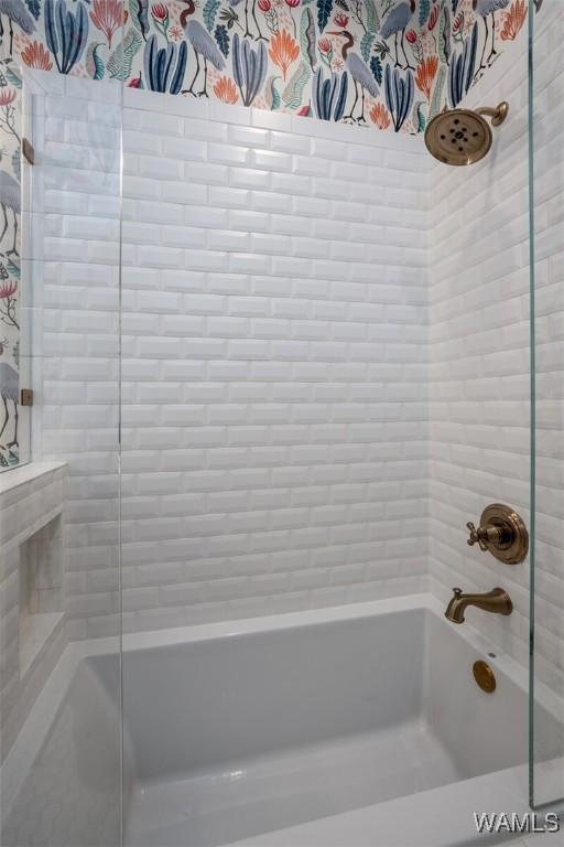 bathroom featuring a washtub, wood-type flooring, tile walls, and vanity