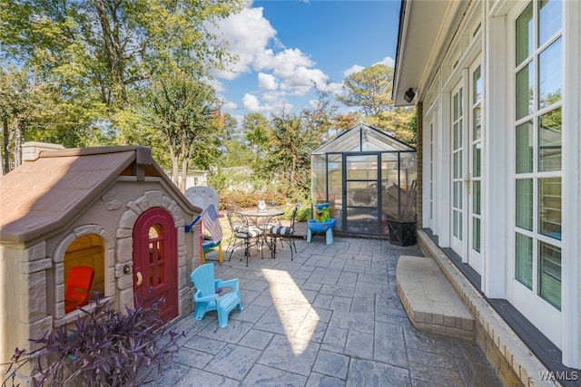 view of patio featuring an outdoor structure