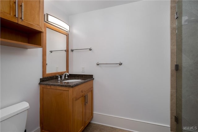 1018 Hackberry Ln Unit 301, Tuscaloosa, AL 35401 - full bathroom with vanity, a shower stall, and tile patterned flooring