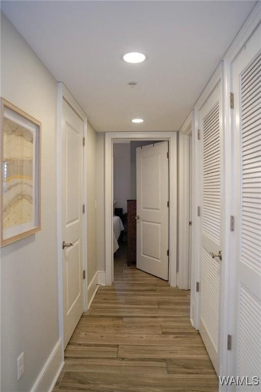 1018 Hackberry Ln Unit 113, Tuscaloosa, AL 35401 - hall featuring wood finished floors and recessed lighting
