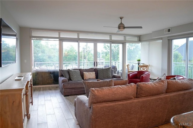 1018 Hackberry Ln Unit 113, Tuscaloosa, AL 35401 - living room featuring ceiling fan and light wood finished floors