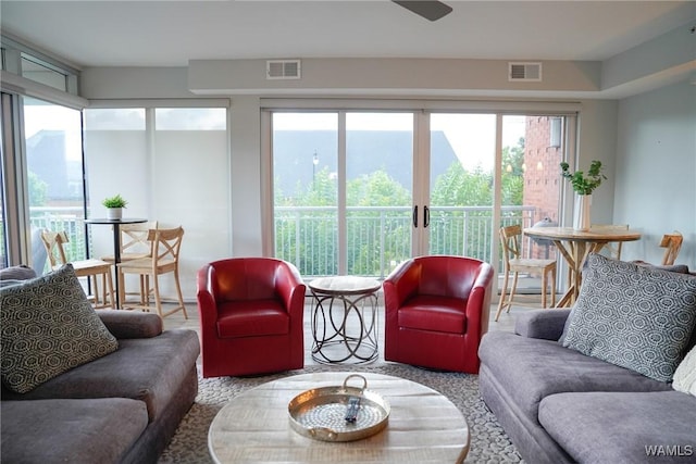 1018 Hackberry Ln Unit 113, Tuscaloosa, AL 35401 - living room featuring plenty of natural light and a ceiling fan