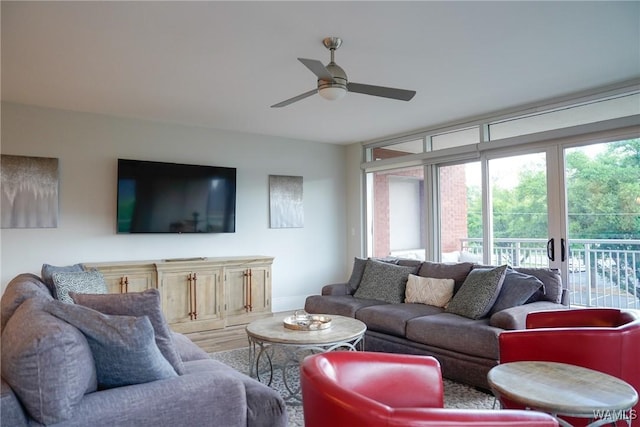 1018 Hackberry Ln Unit 113, Tuscaloosa, AL 35401 - living area with wood finished floors and ceiling fan