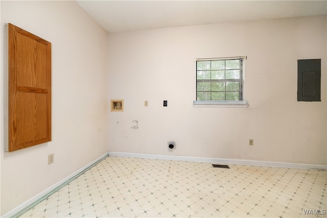 washroom with hookup for an electric dryer, electric panel, and washer hookup