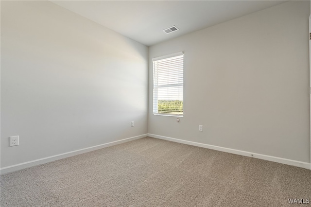 unfurnished room with carpet floors