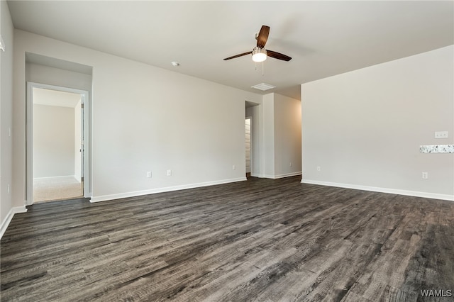 unfurnished room featuring dark hardwood / wood-style flooring and ceiling fan