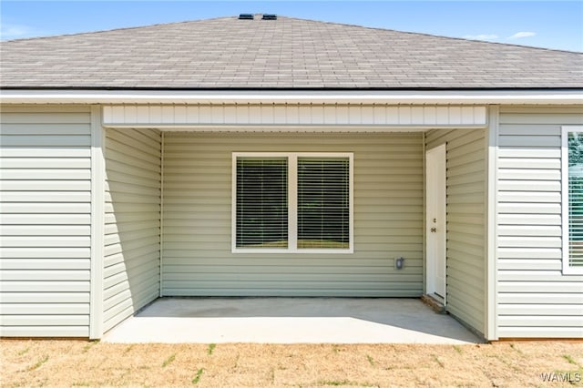 rear view of property with a patio area