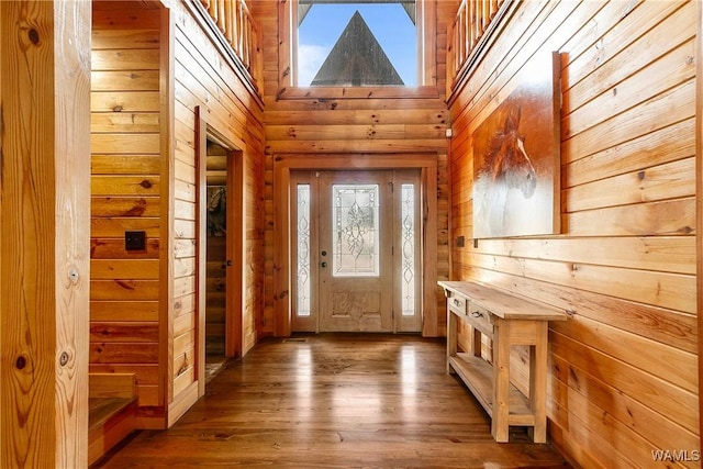 20442 Old Jasper Rd, Northport, AL 35475 - entrance foyer with wooden walls, a towering ceiling, and wood finished floors