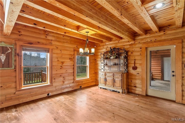 20442 Old Jasper Rd, Northport, AL 35475 - unfurnished dining area featuring a wealth of natural light, beam ceiling, light wood-style flooring, and wooden ceiling