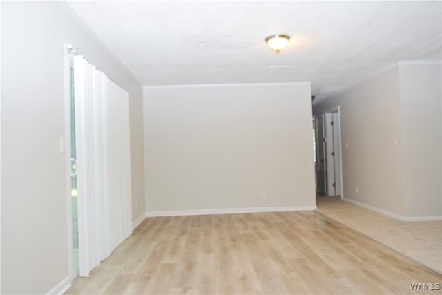 unfurnished room featuring light wood-type flooring