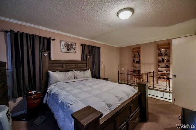 carpeted bedroom featuring ornamental molding and a textured ceiling