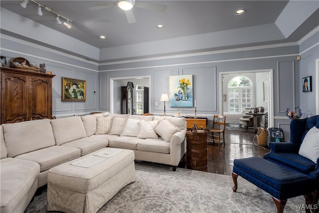 1137 Germantown Rd, Tuscaloosa, AL 35406 - living area featuring a decorative wall, ceiling fan, rail lighting, wood finished floors, and crown molding