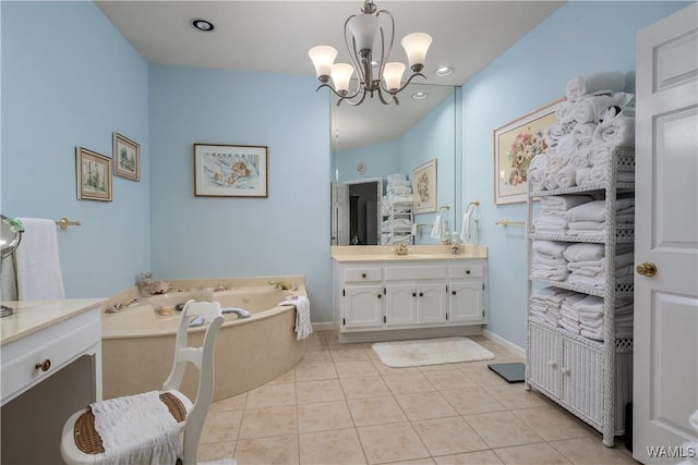 1137 Germantown Rd, Tuscaloosa, AL 35406 - full bathroom with vanity, a bath, a chandelier, and tile patterned floors