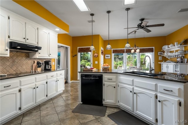 1137 Germantown Rd, Tuscaloosa, AL 35406 - kitchen with black appliances, under cabinet range hood, a ceiling fan, backsplash, and white cabinetry