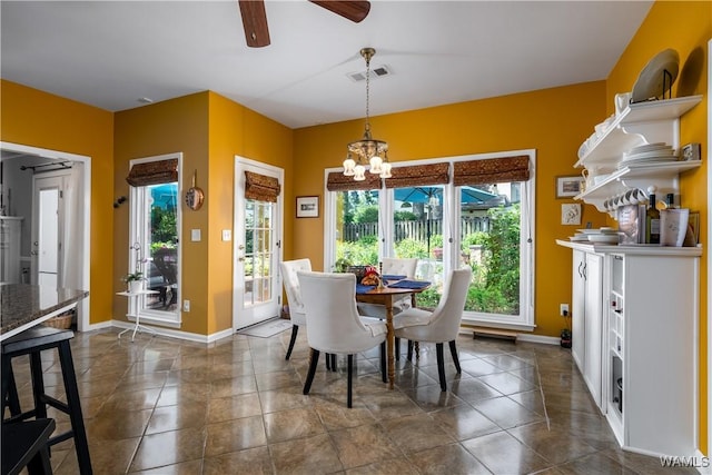 1137 Germantown Rd, Tuscaloosa, AL 35406 - dining space with a chandelier and ceiling fan