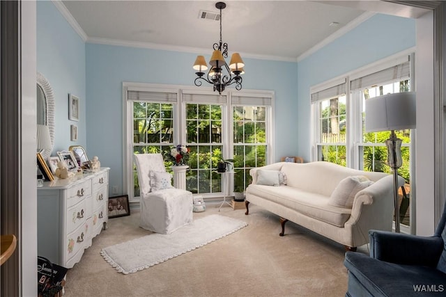 1137 Germantown Rd, Tuscaloosa, AL 35406 - living area with carpet, a chandelier, and crown molding