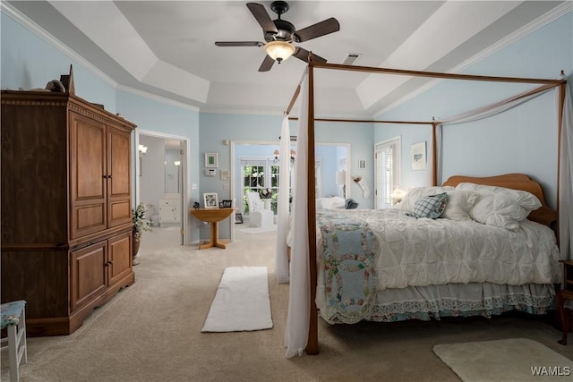 1137 Germantown Rd, Tuscaloosa, AL 35406 - bedroom with light colored carpet, a tray ceiling, crown molding, and a ceiling fan