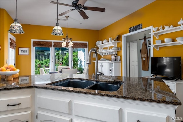1137 Germantown Rd, Tuscaloosa, AL 35406 - kitchen with a ceiling fan, white cabinets, open shelves, and decorative light fixtures
