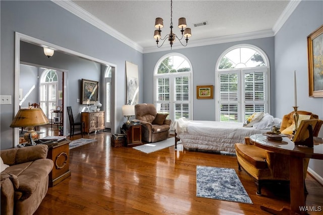 1137 Germantown Rd, Tuscaloosa, AL 35406 - bedroom with wood finished floors, a chandelier, and crown molding