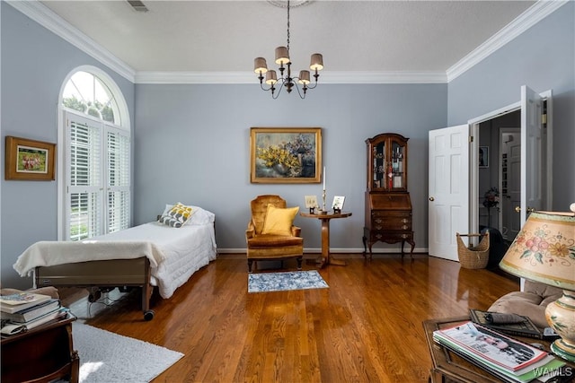 1137 Germantown Rd, Tuscaloosa, AL 35406 - bedroom featuring ornamental molding, a chandelier, and wood finished floors