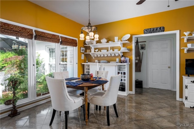 1137 Germantown Rd, Tuscaloosa, AL 35406 - dining space featuring baseboards and ceiling fan
