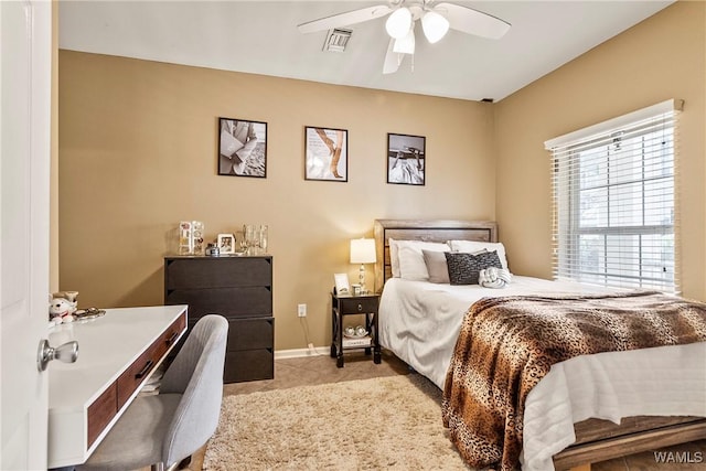 303 Helen Keller Blvd Unit B117, Tuscaloosa, AL 35404 - tiled bedroom featuring visible vents, baseboards, and a ceiling fan
