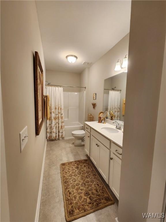 15525 Tide Water Ter, Brookwood, AL 35444 - full bath featuring vanity, toilet, baseboards, and shower / bathtub combination with curtain