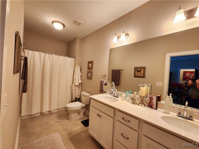 15525 Tide Water Ter, Brookwood, AL 35444 - ensuite bathroom featuring double vanity and toilet