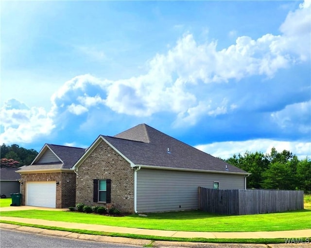 15525 Tide Water Ter, Brookwood, AL 35444 - view of front facade featuring brick siding, a shingled roof, a garage, and driveway
