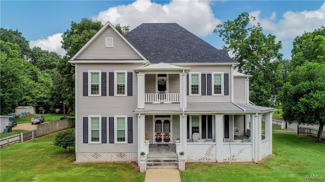 view of front of home featuring a porch and a front lawn