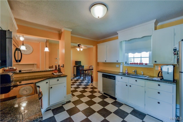 kitchen featuring stainless steel appliances, ceiling fan, crown molding, sink, and white cabinets