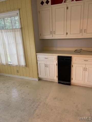 kitchen featuring white cabinets and light wood-type flooring