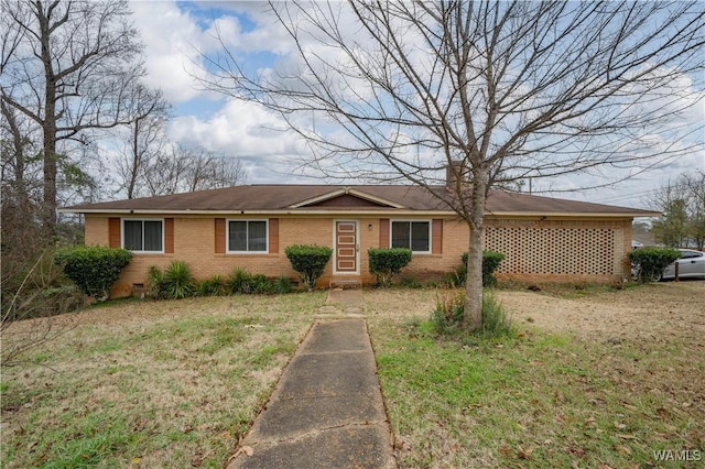 single story home featuring a front yard