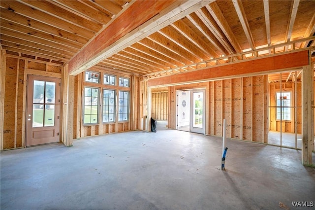 14326 Highland Lakes Dr, Northport, AL 35475 - misc room with plenty of natural light and concrete flooring