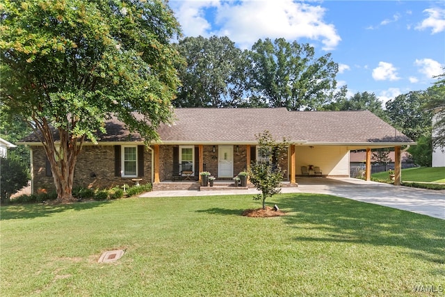 ranch-style home with a carport and a front lawn