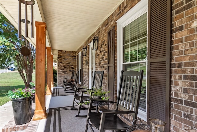 view of patio featuring a porch