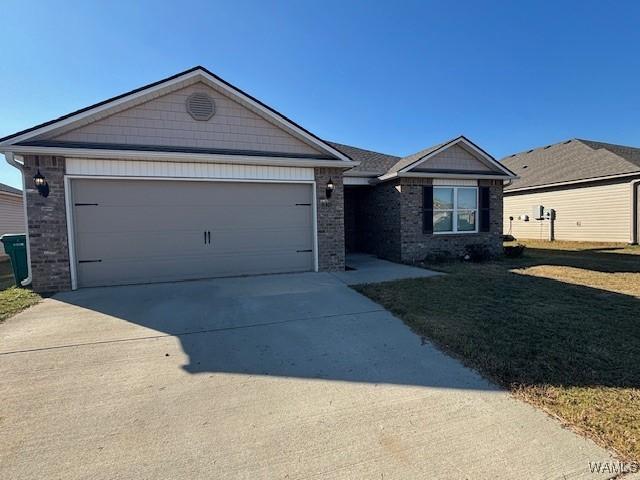 ranch-style home with concrete driveway, an attached garage, and brick siding