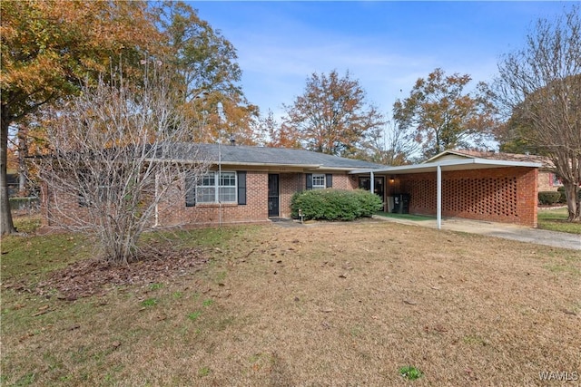 single story home with a front yard and a carport