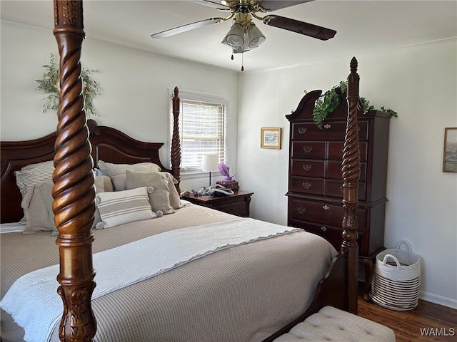 bedroom featuring ceiling fan, dark hardwood / wood-style flooring, and ornamental molding