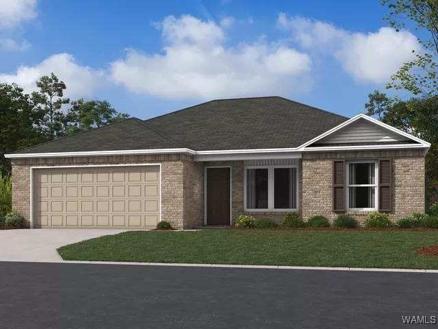 view of front of house featuring a garage and a front lawn