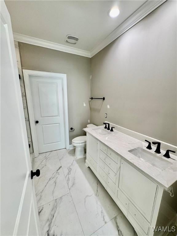 bathroom with marble finish floor, ornamental molding, a sink, and toilet