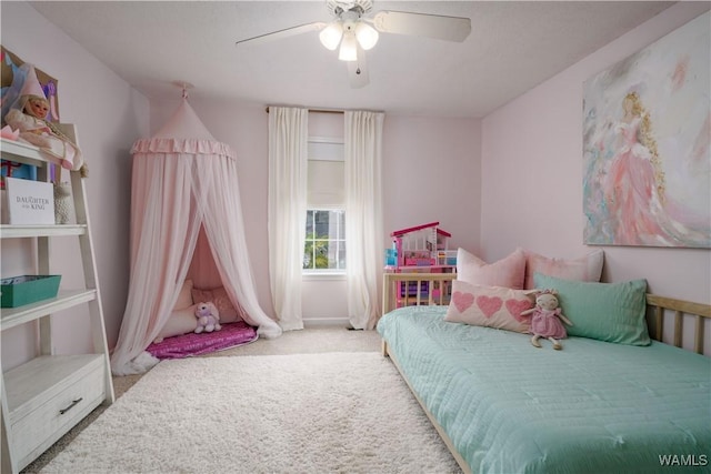 carpeted bedroom featuring ceiling fan