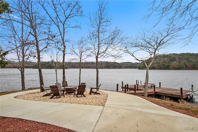 10649 Legacy Point Dr, Northport, AL 35475 - dock area with a water view, a view of trees, and an outdoor fire pit