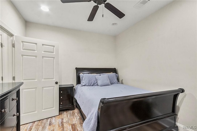 10649 Legacy Point Dr, Northport, AL 35475 - bedroom with light wood-type flooring, ceiling fan, and recessed lighting