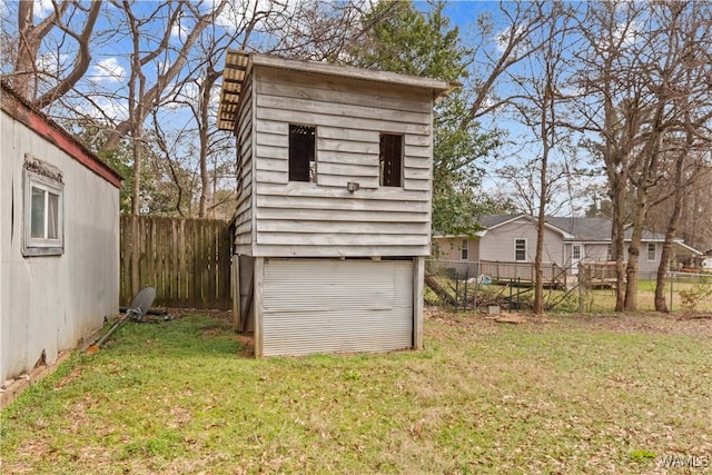 view of shed featuring a fenced backyard