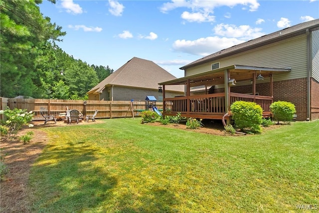 2757 Lily Cir, Northport, AL 35473 - view of yard with a deck and a fire pit